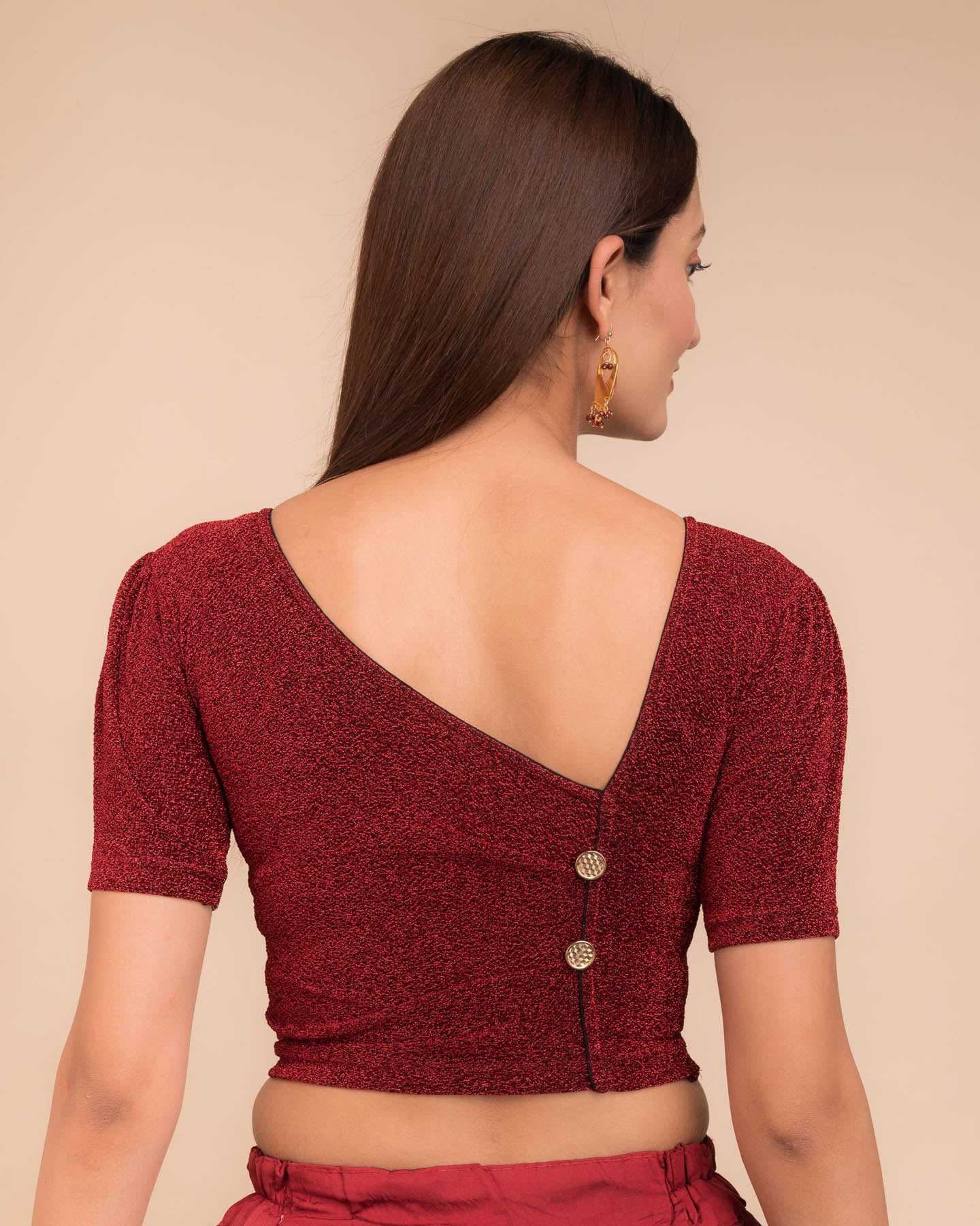 Rear view showcasing the back silhouette and half sleeves