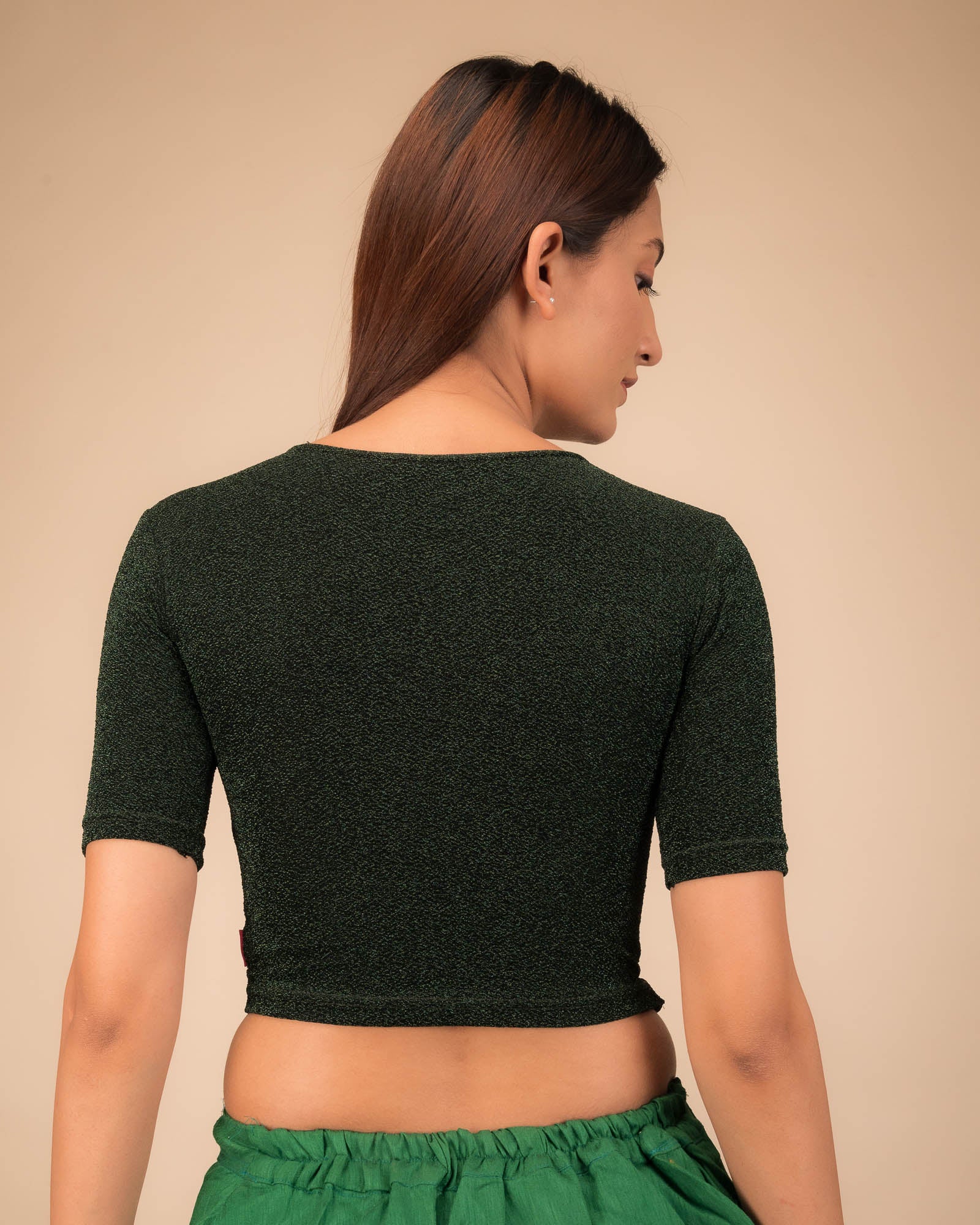 Rear view showcasing slip-on design and elbow sleeve fit.