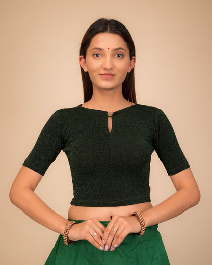 Model wearing a metallic-zari stretchable blouse with a bow-keyhole neckline and elbow sleeves