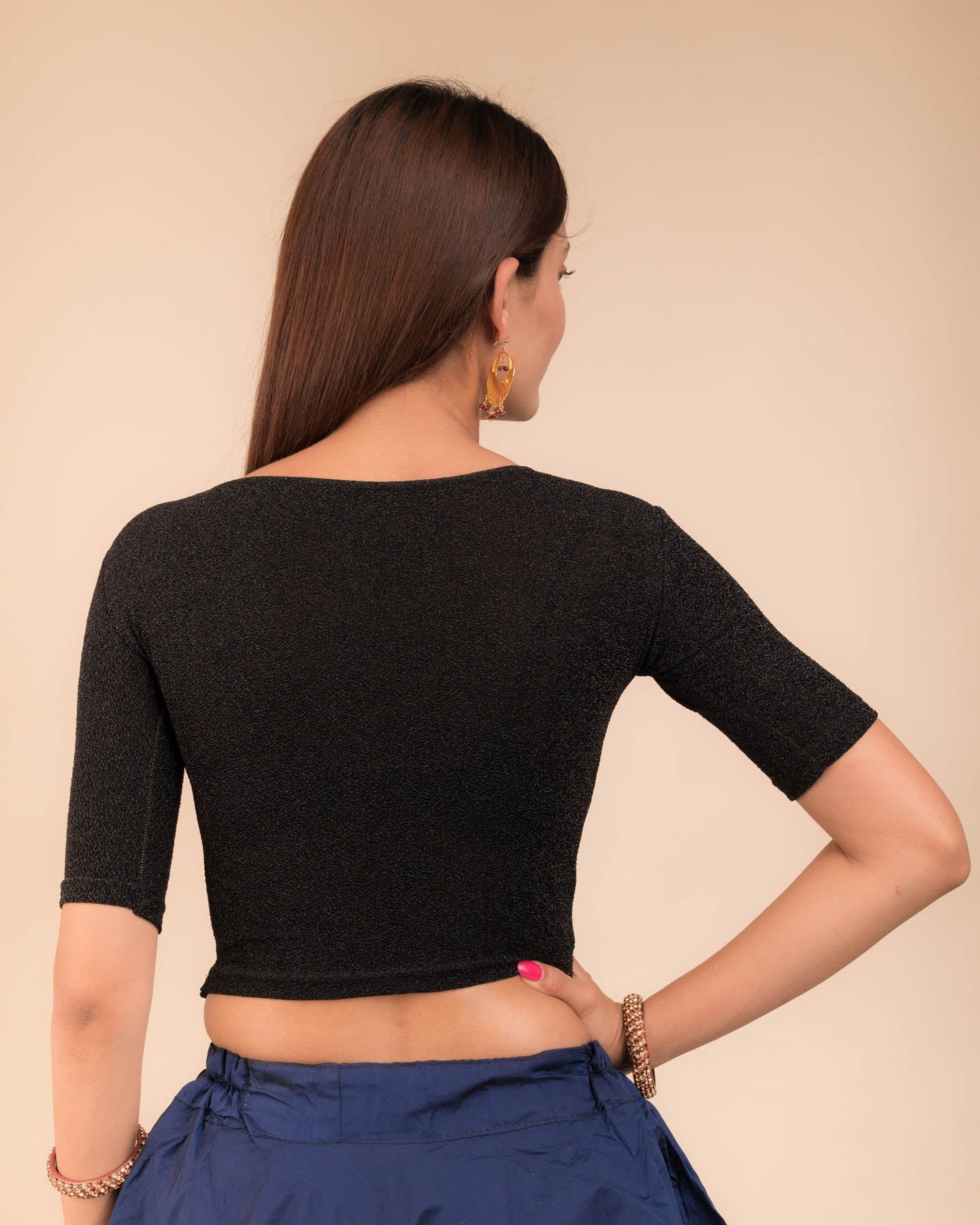 Rear view showcasing slip-on design and elbow sleeve fit.