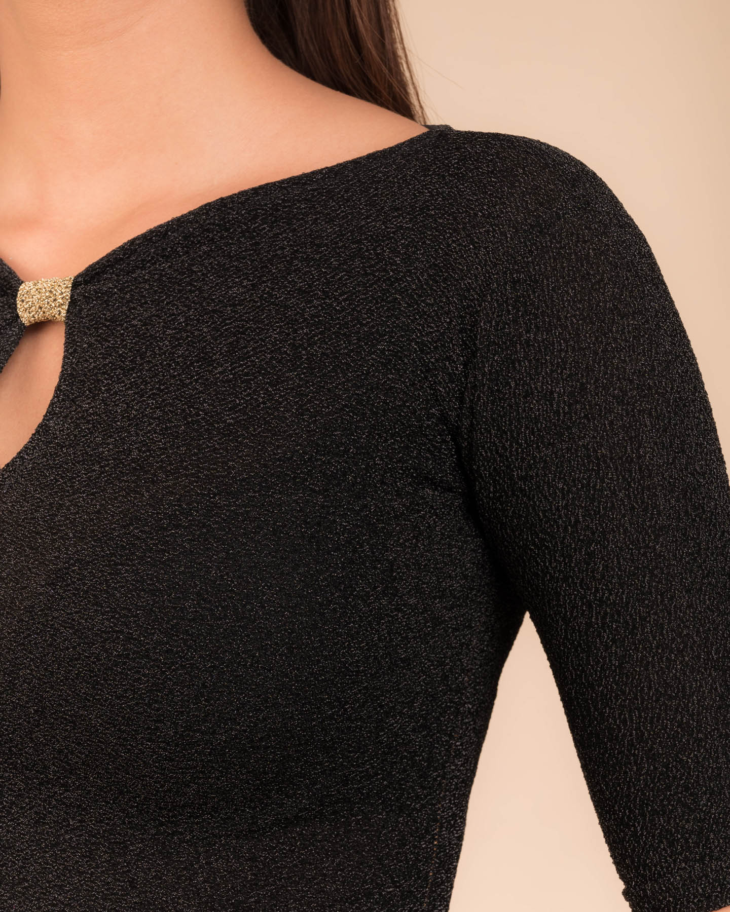 Close-up of the metallic knit texture and subtle zari lines.