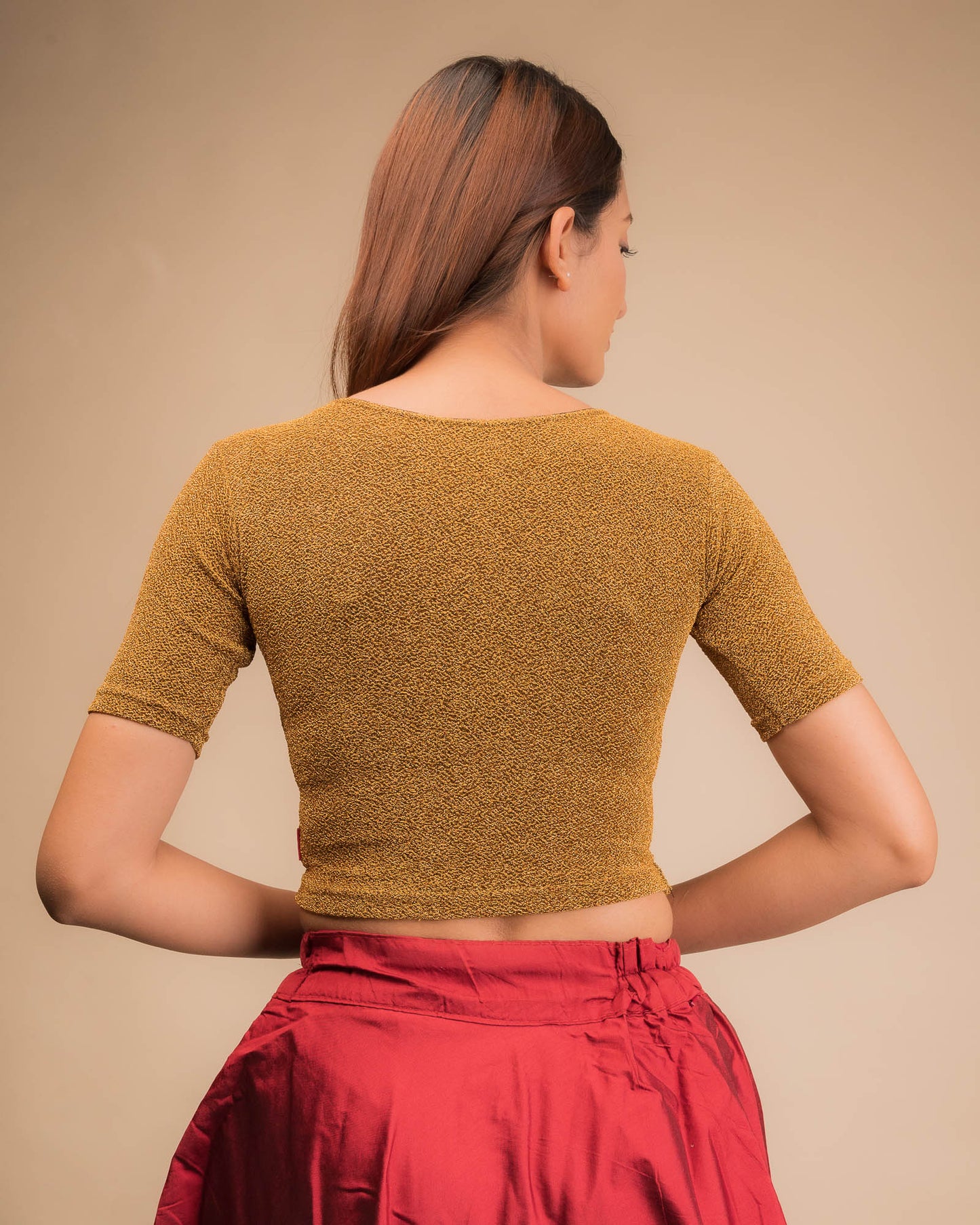 Rear view showcasing slip-on design and elbow sleeve fit.