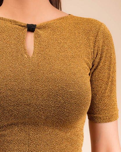 Close-up of the metallic knit texture and subtle zari lines.