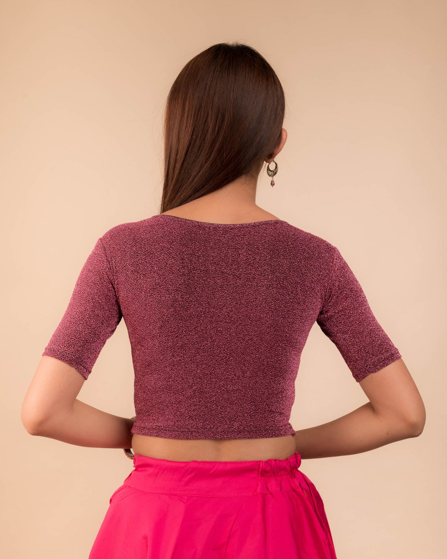 Rear view showcasing slip-on design and elbow sleeve fit.