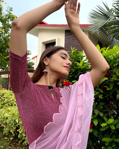 Model pairing the blouse with a saree for a chic festive look.