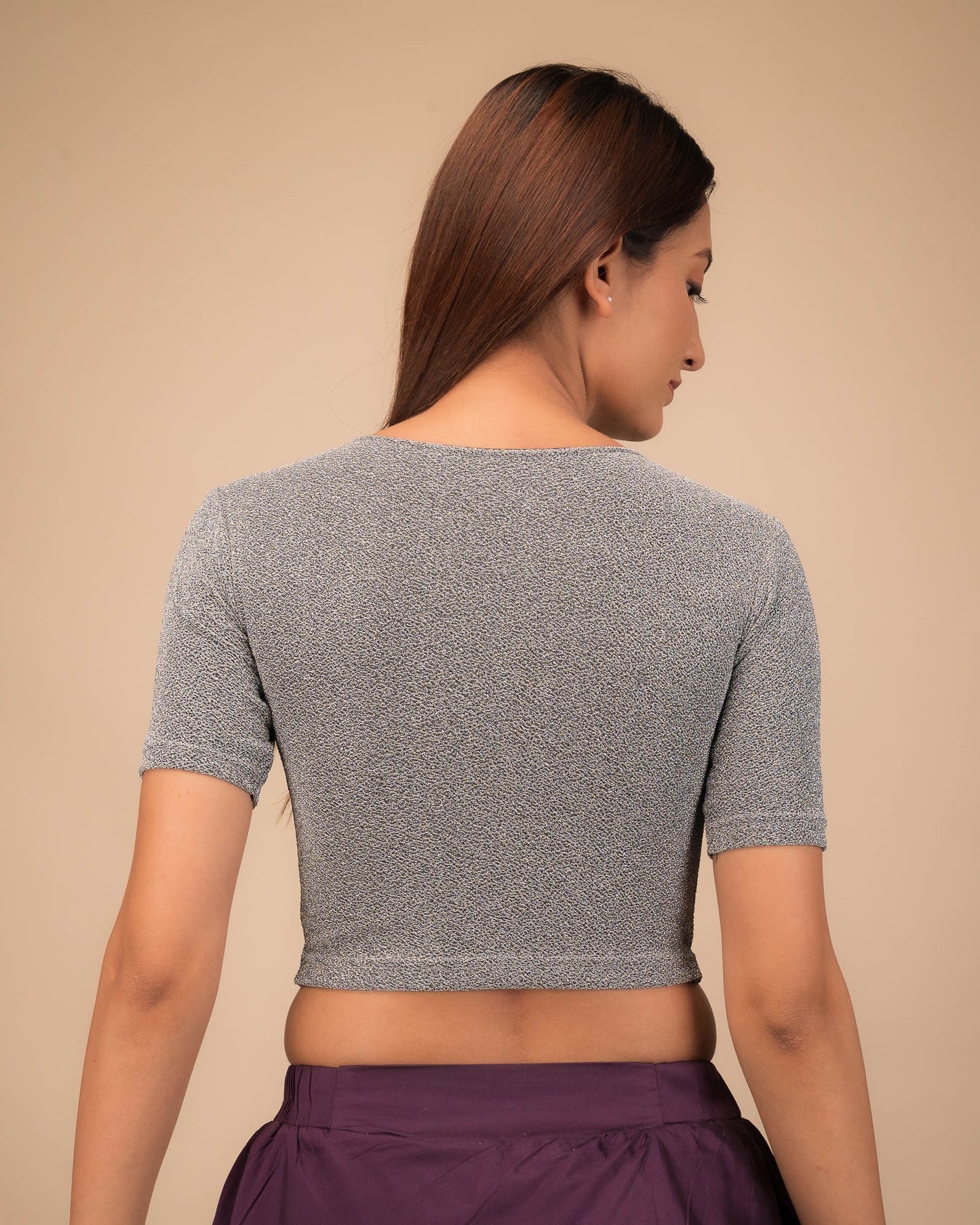 Rear view showcasing slip-on design and elbow sleeve fit.