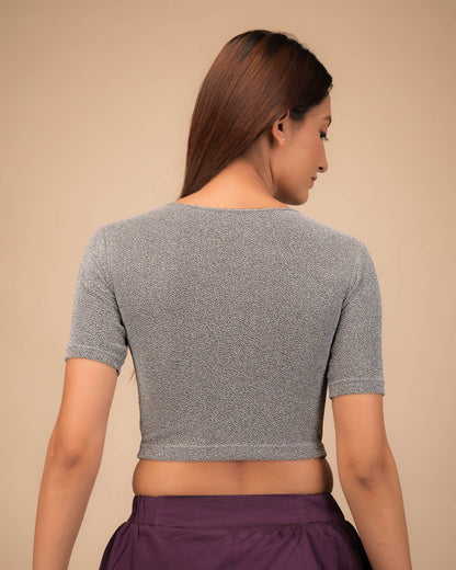 Rear view showcasing slip-on design and elbow sleeve fit.