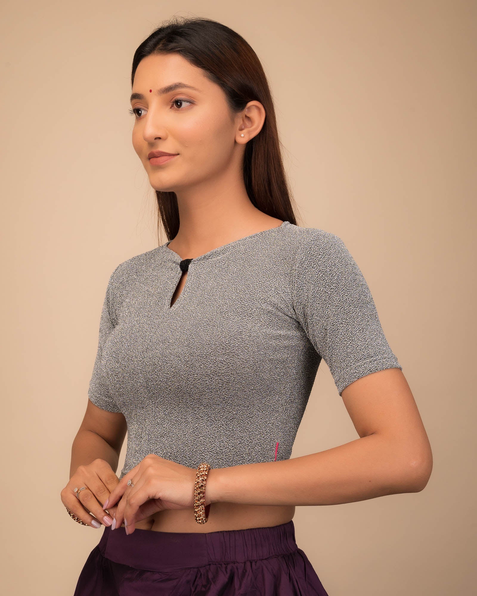 Side profile highlighting the fabric sheen and sleek silhouette