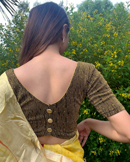 Model pairing the blouse with a festive saree for an elevated ethnic look.