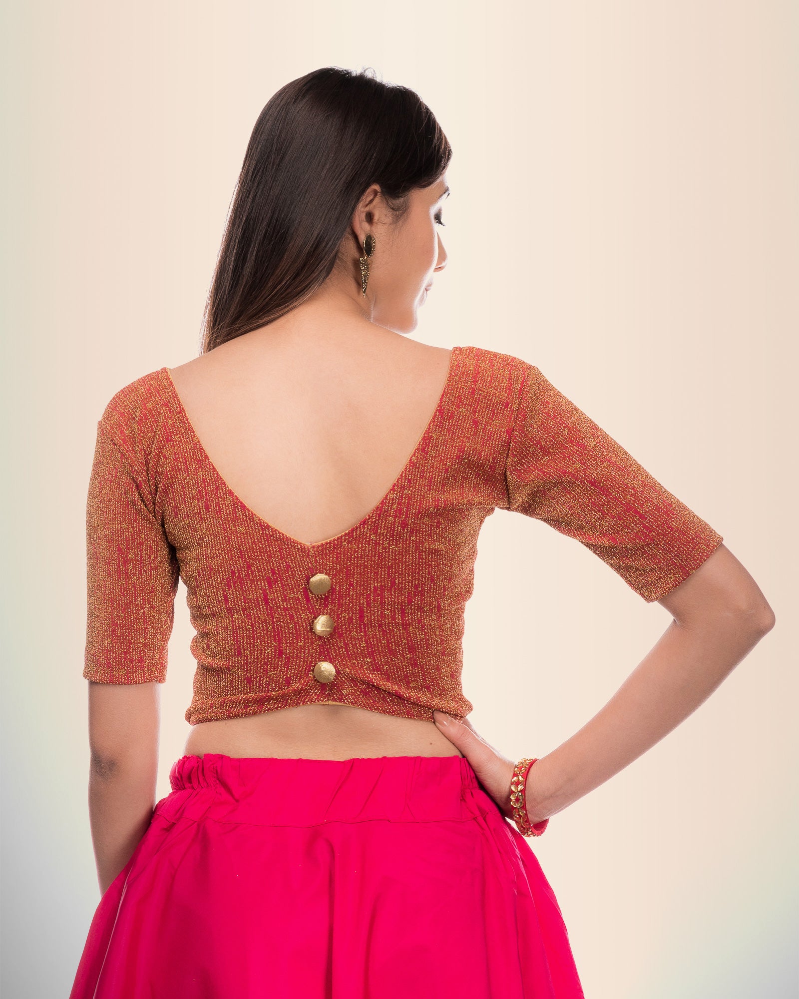 Rear view showing the button-placket back design.