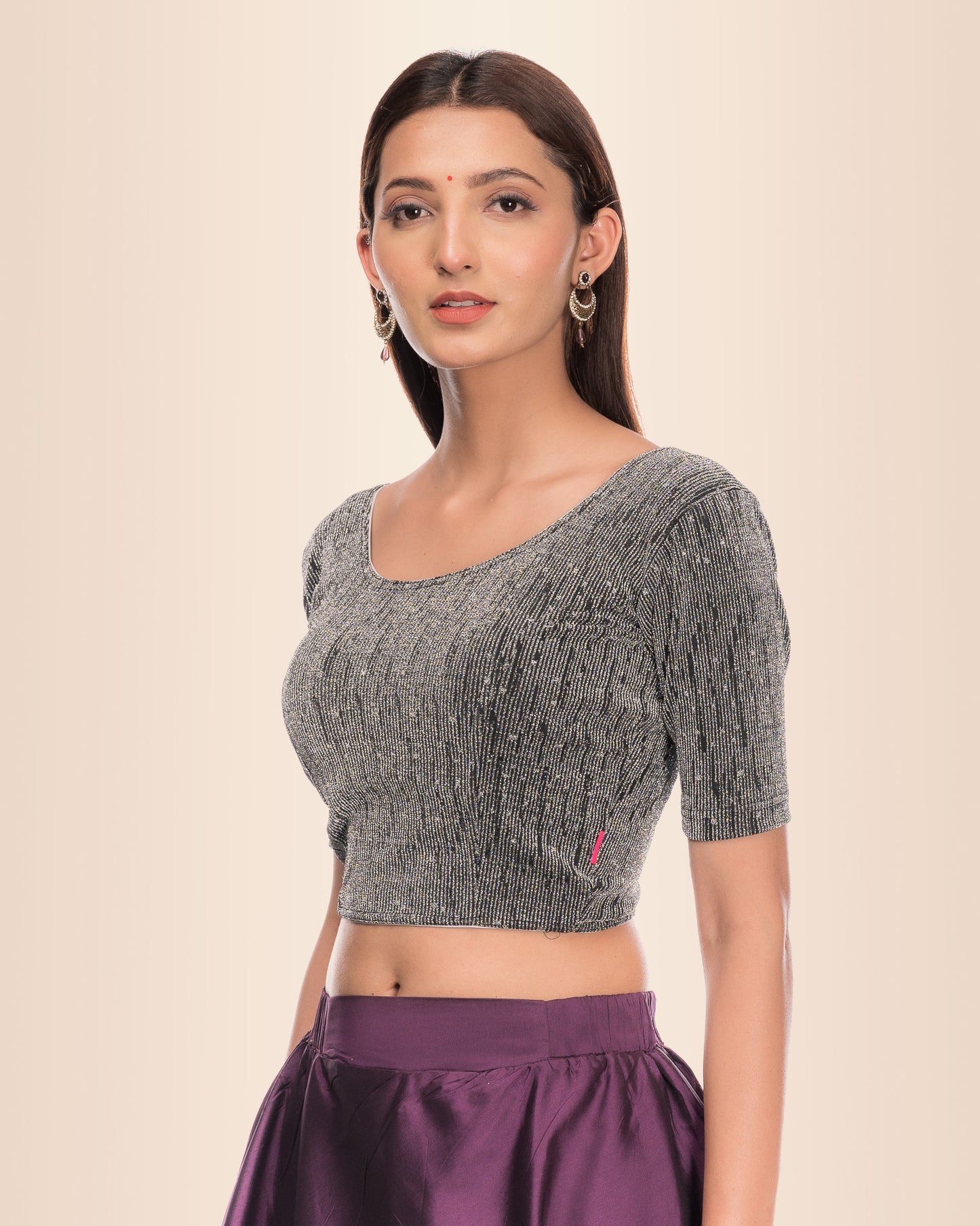 Side profile highlighting the sleeve length and silhouette