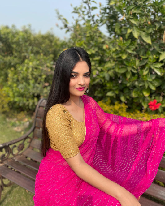 Model styled with a saree for an elegant, festive ensemble.