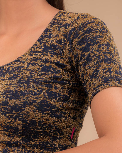 Close‑up of the metallic zari woven texture