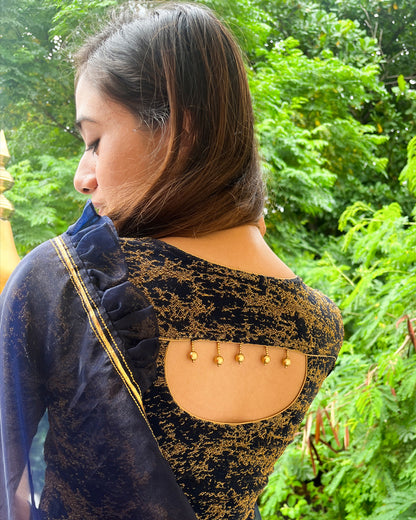 Model pairing the blouse with an ethnic saree and lehenga to highlight the latkan detailing