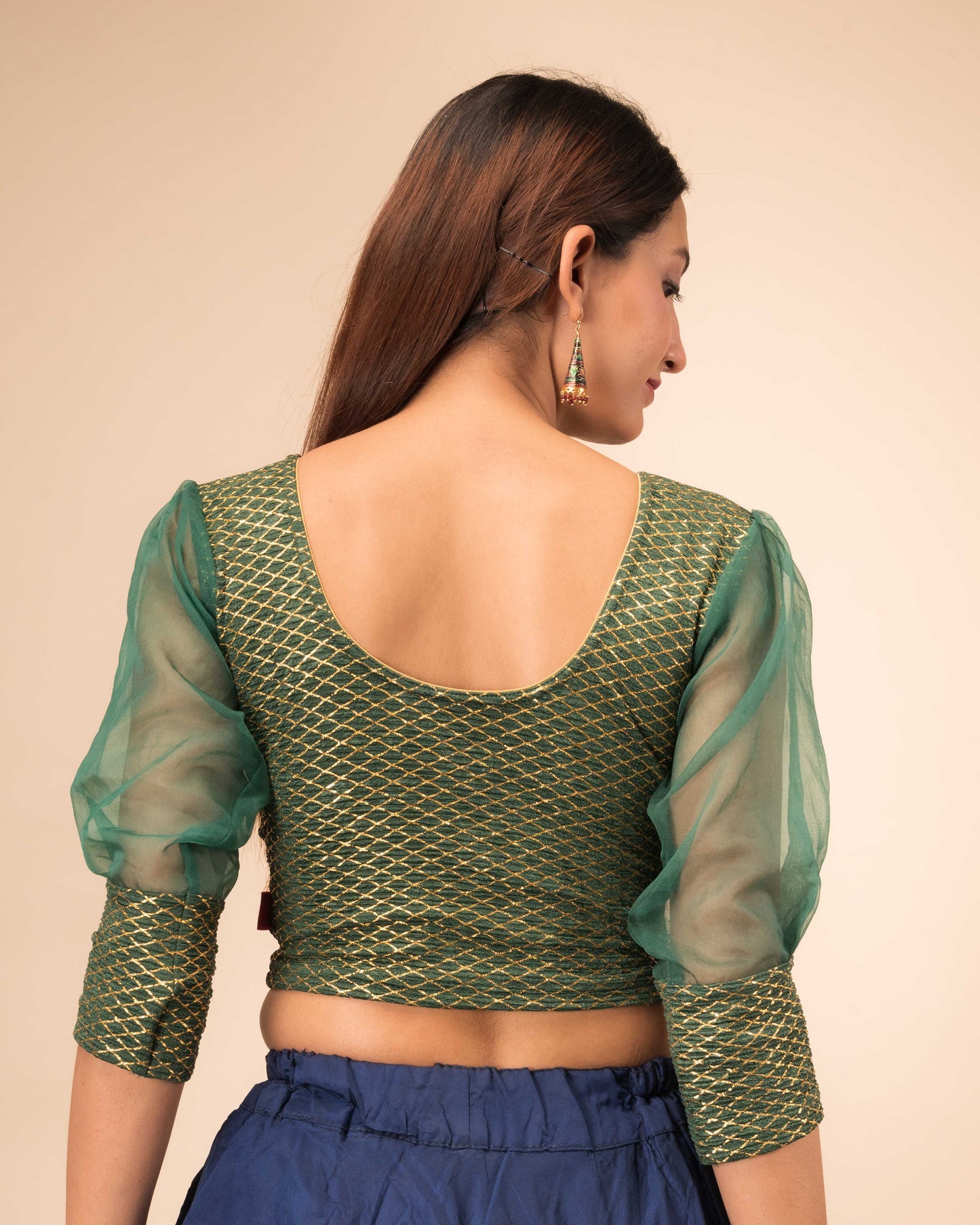 Rear view showcasing the back fit and sleeve shape