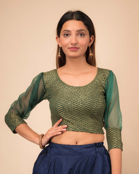Model wearing a stretchable crushed organza blouse with long balloon sleeves, round neckline, and gold check pattern