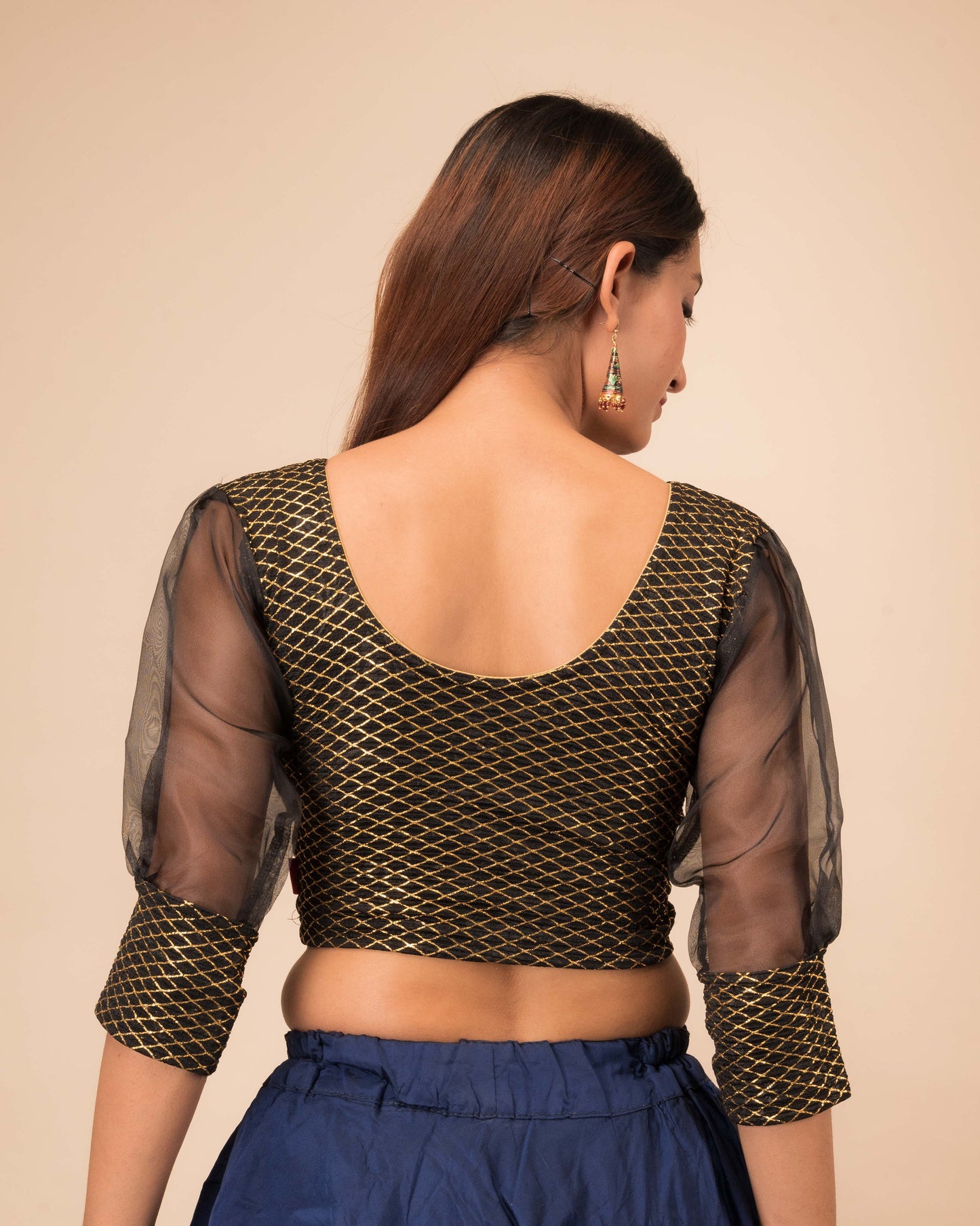Rear view showcasing the back fit and sleeve shape