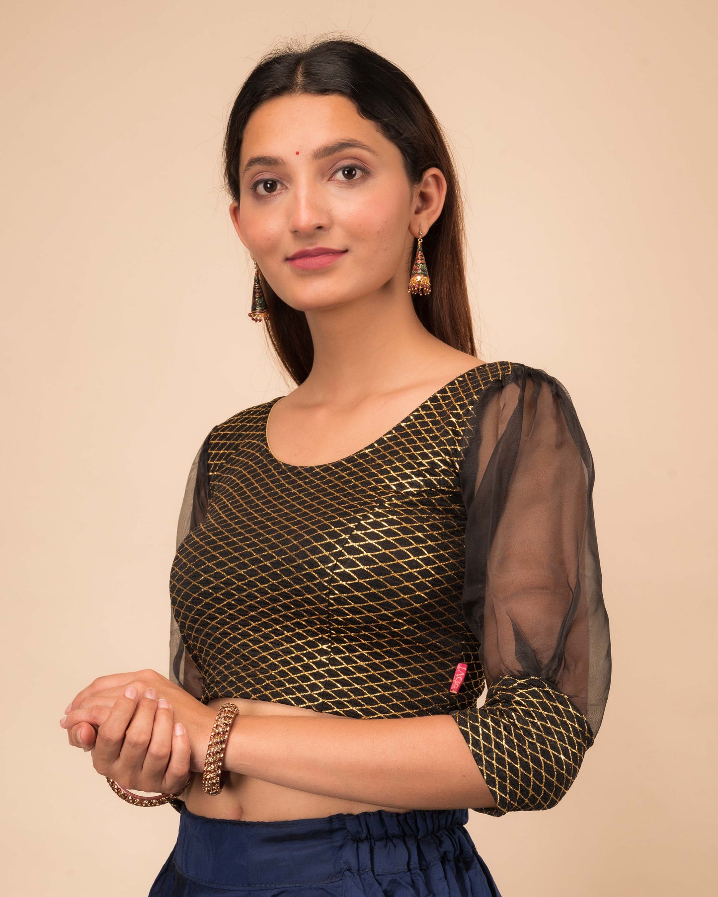  Side profile highlighting the puffed sleeves with cuffs