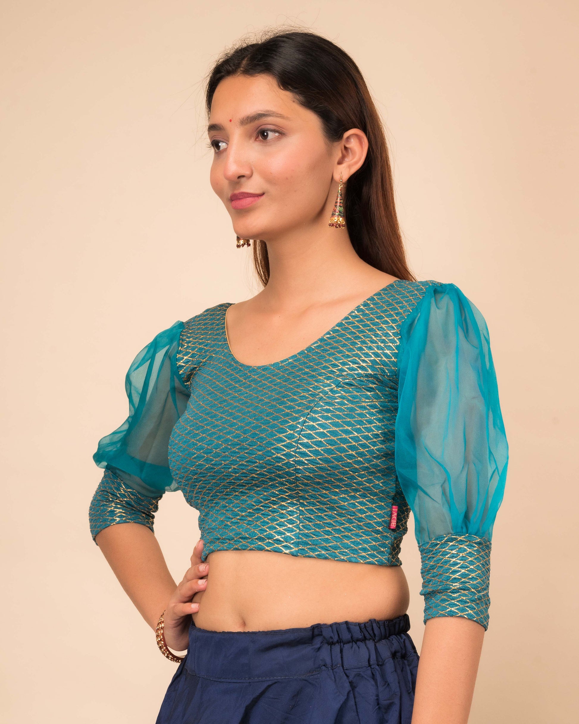 Side profile highlighting the puffed sleeves with cuffs