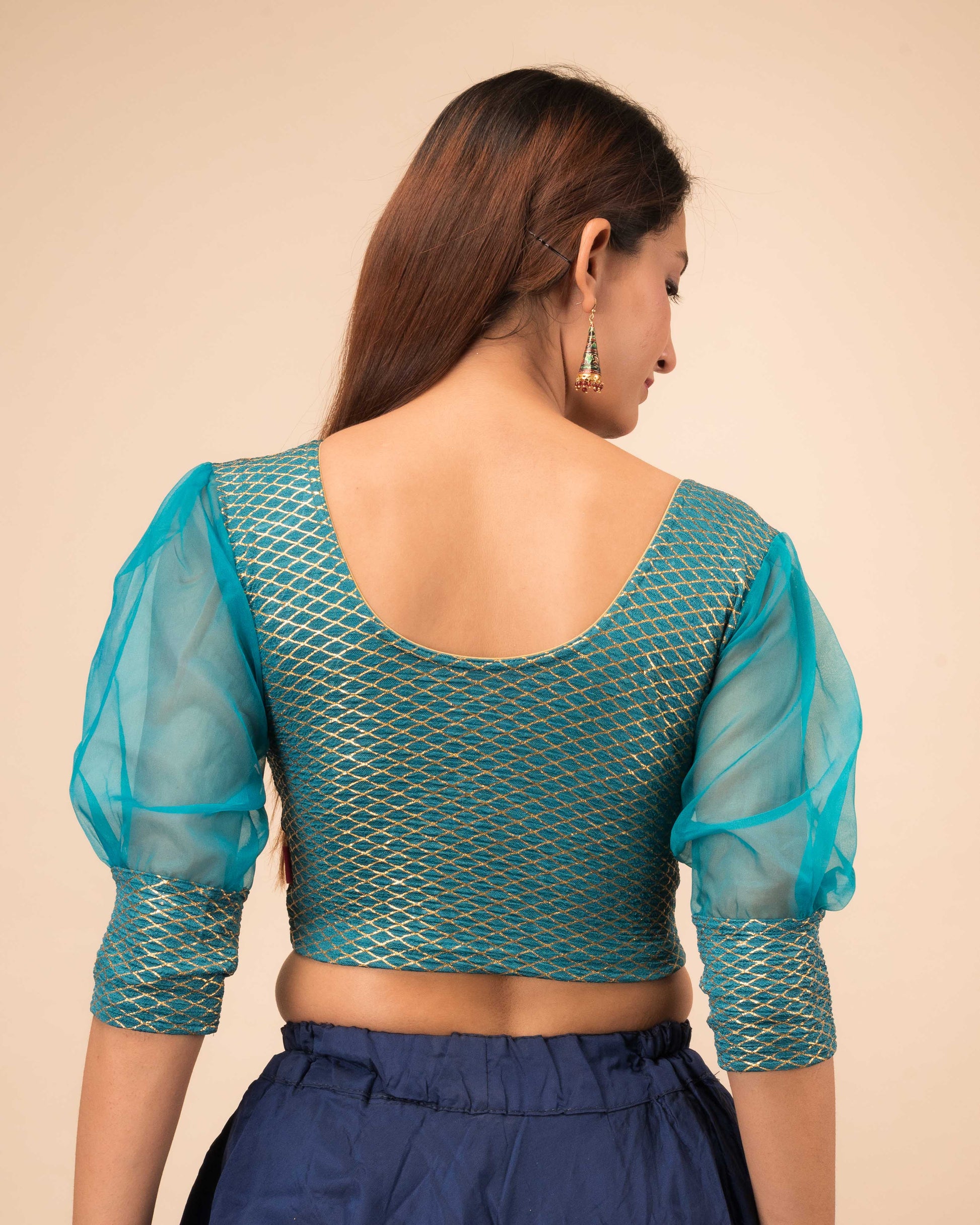 Rear view showcasing the back fit and sleeve shape