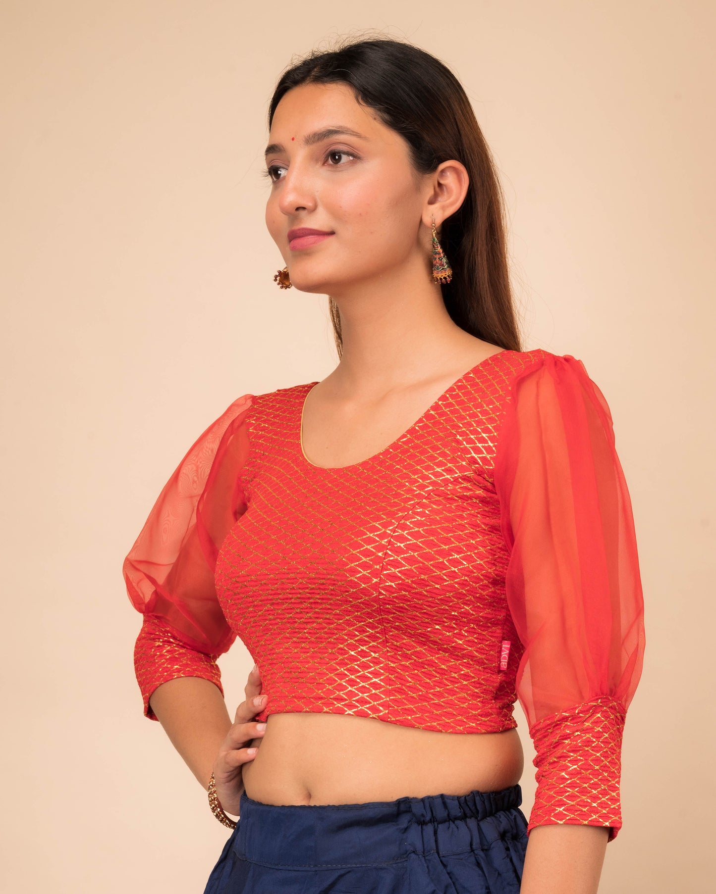  Side profile highlighting the puffed sleeves with cuffs