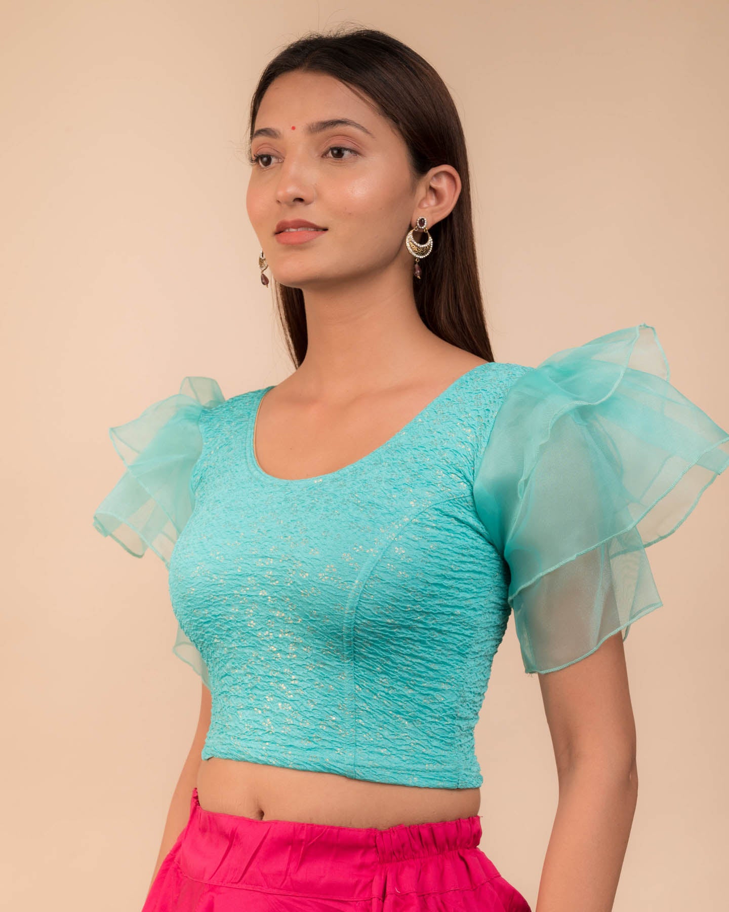 Side angle highlighting the sleeve depth and fit silhouette