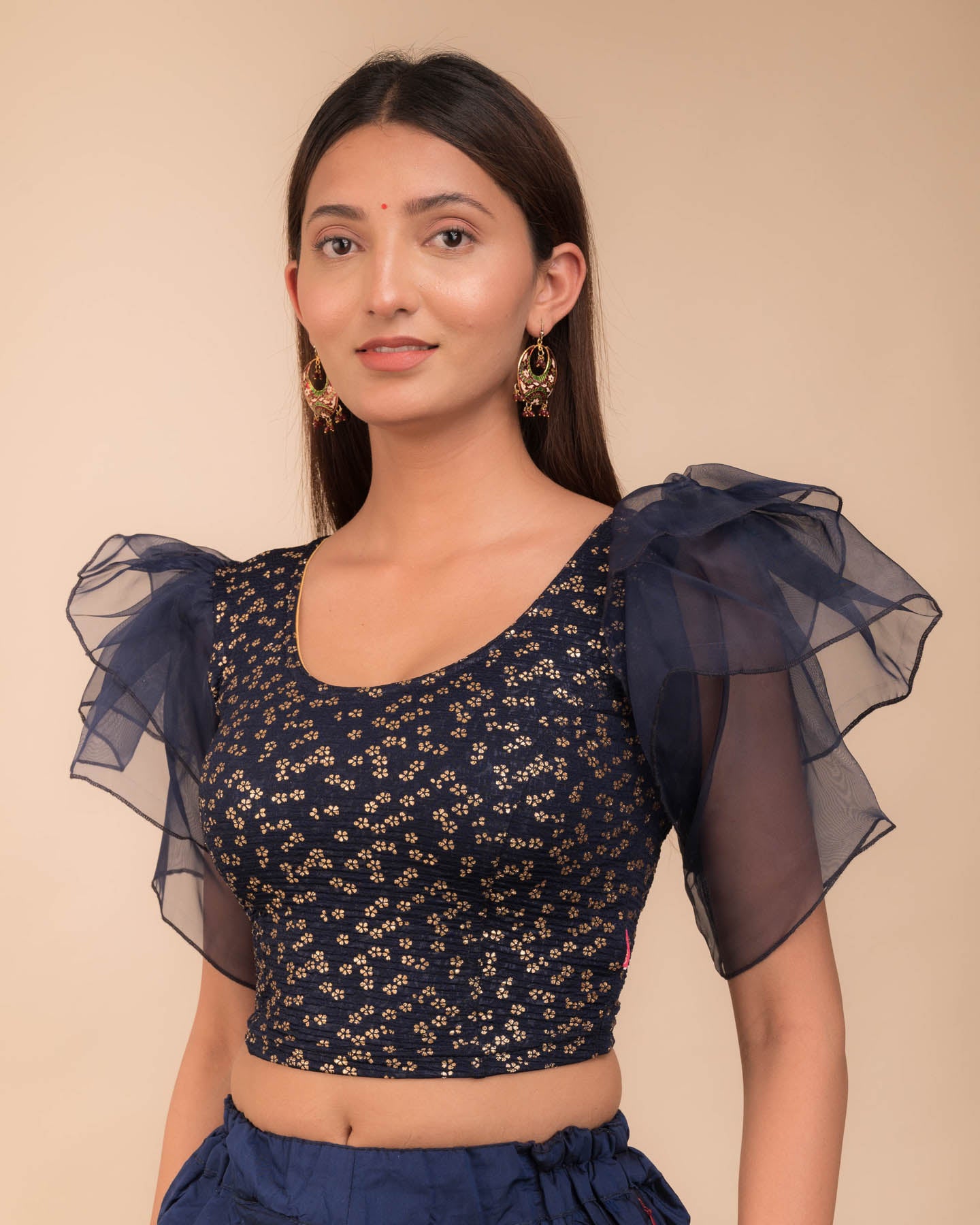 Side angle highlighting the sleeve depth and fit silhouette