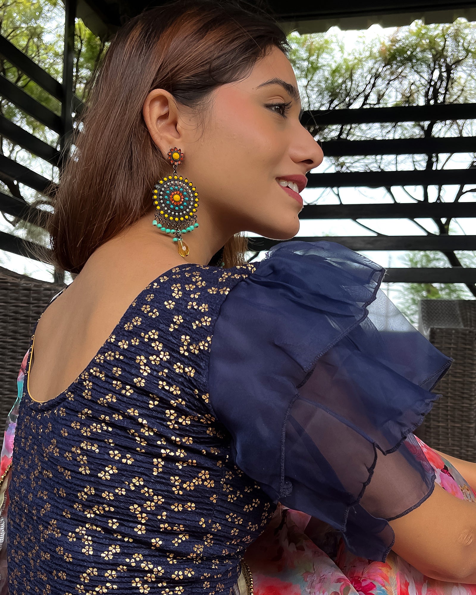 Model pairing the blouse with a saree for a festive, elegant look