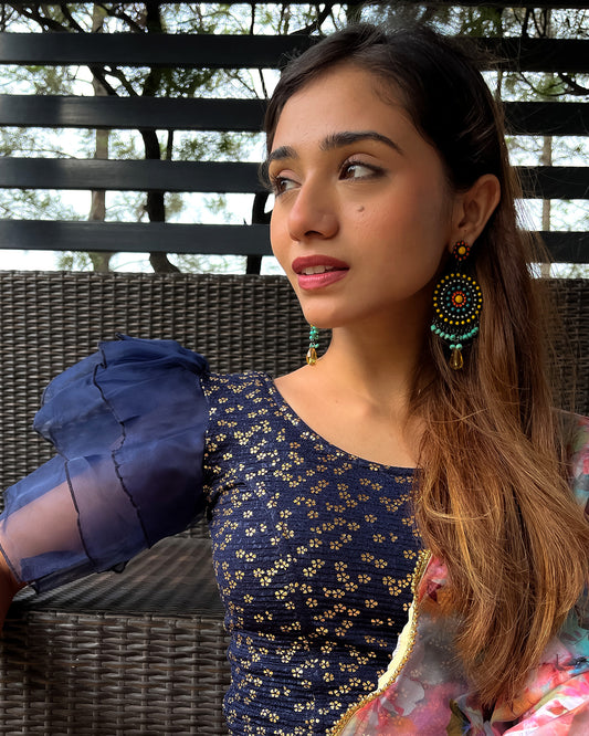 Model pairing the blouse with a saree for a festive, elegant look