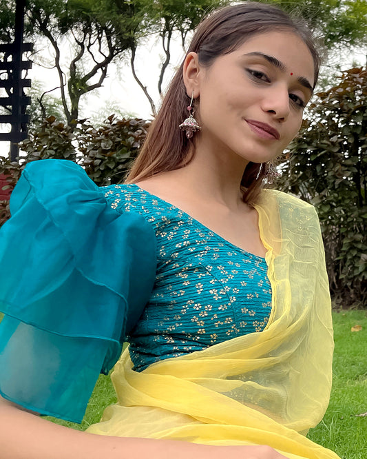 Model pairing the blouse with a saree for a festive, elegant look