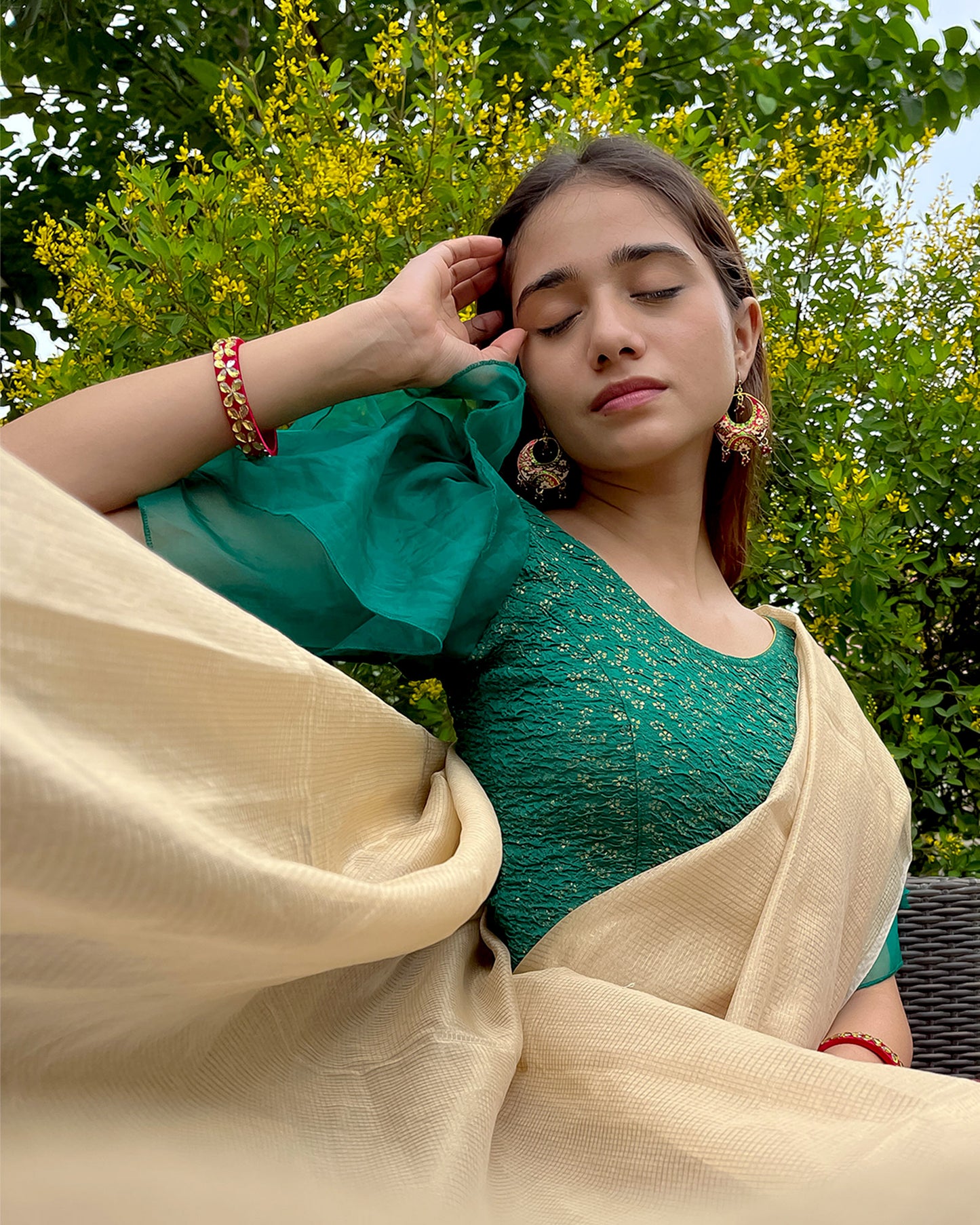 Model pairing the blouse with a saree for a festive, elegant look
