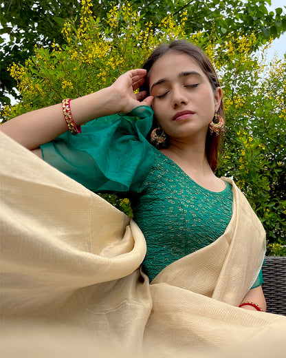 Model pairing the blouse with a saree for a festive, elegant look