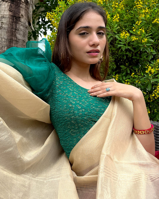 Model pairing the blouse with a saree for a festive, elegant look