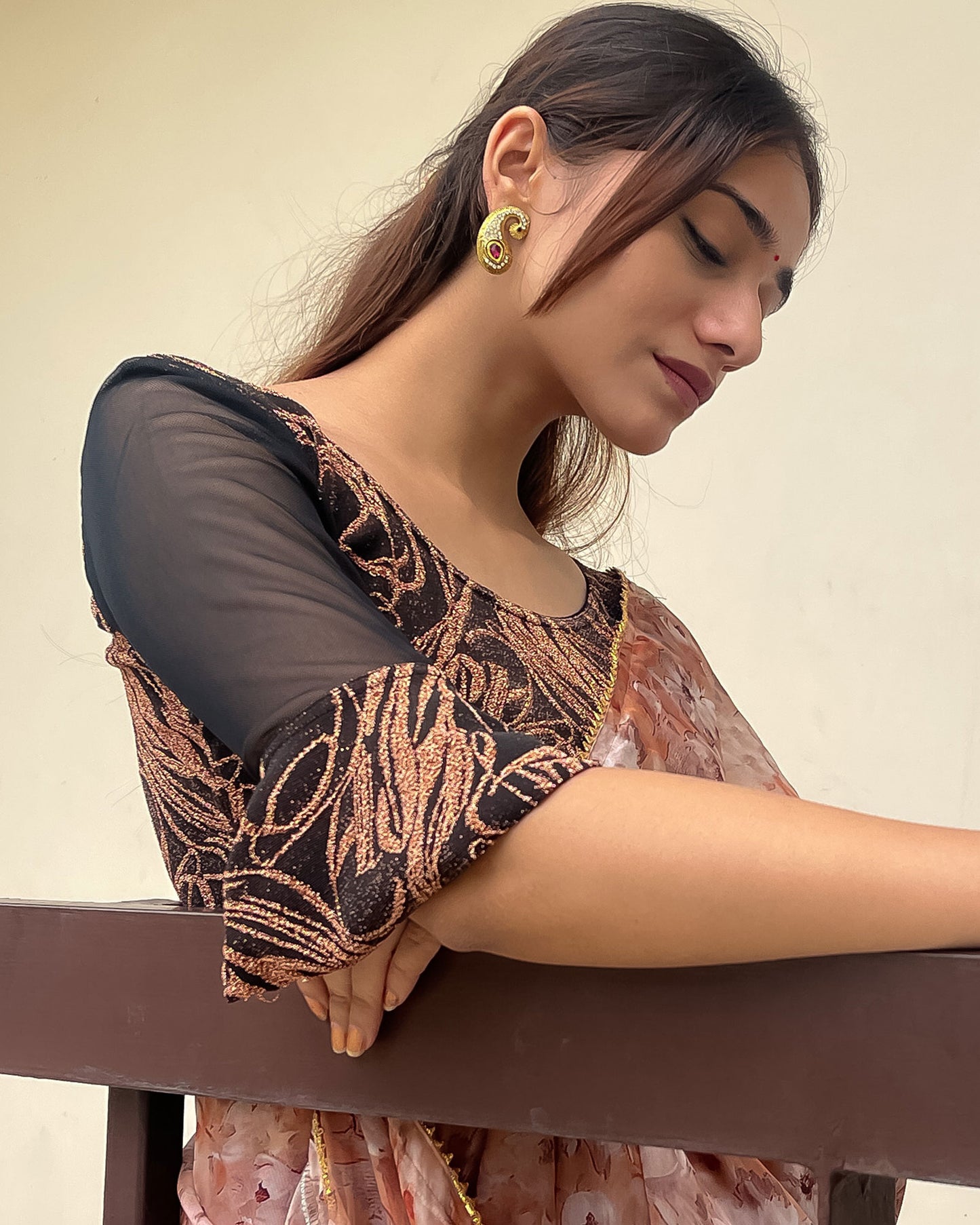 Model pairing the blouse with a saree for an elegant festive ensemble