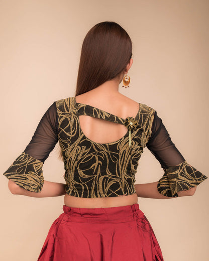  Rear view showcasing the appliqué detailing and back fit.