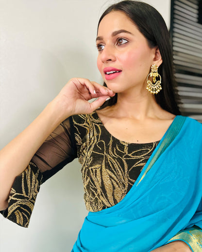 Model pairing the blouse with a saree for an elegant festive ensemble