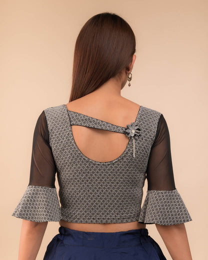  Rear view showcasing the appliqué detailing and back fit.