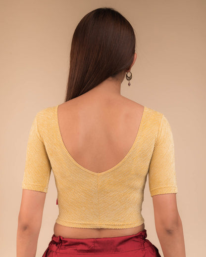Rear view of the stretchable blouse showcasing the striped pattern.