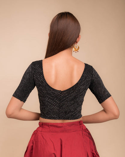 Rear view of the stretchable blouse showcasing the striped pattern.