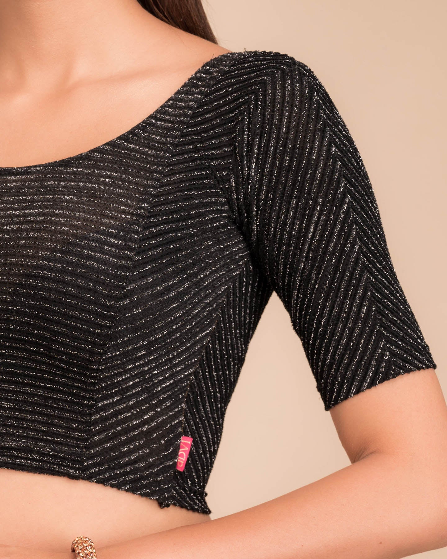 Close-up of the velvet fabric detailing the striped texture.