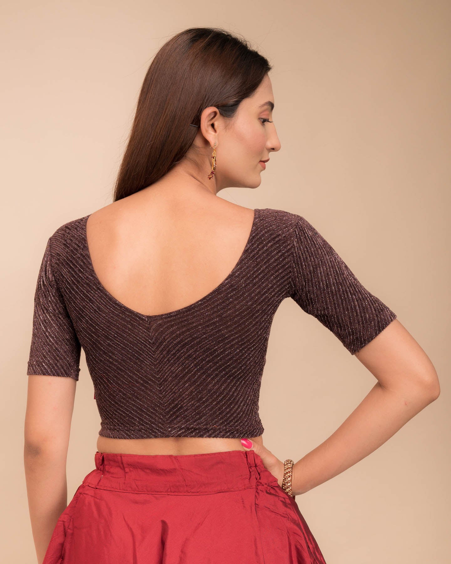 Rear view of the stretchable blouse showcasing the striped pattern.