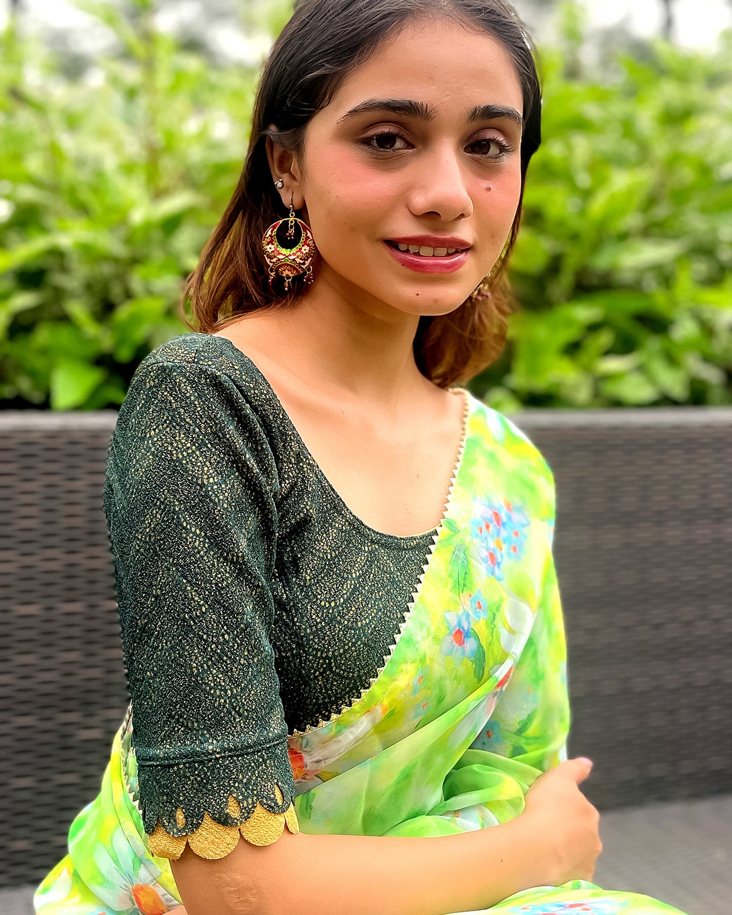 Model pairing the blouse with a saree for a festive look.