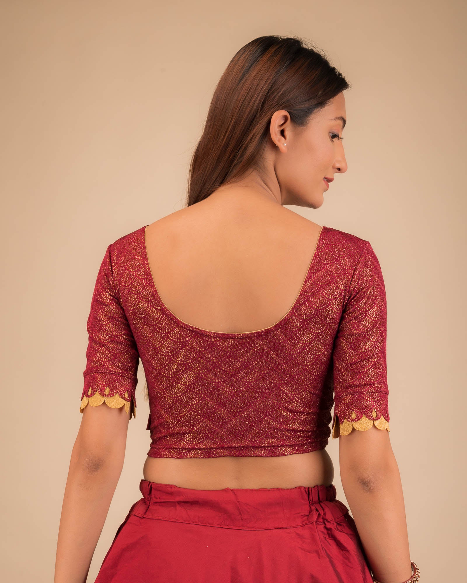 Rear view of the stretchable blouse showcasing the striped pattern.