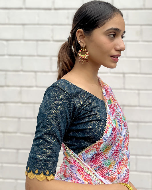 Model pairing the blouse with a saree for a festive look.