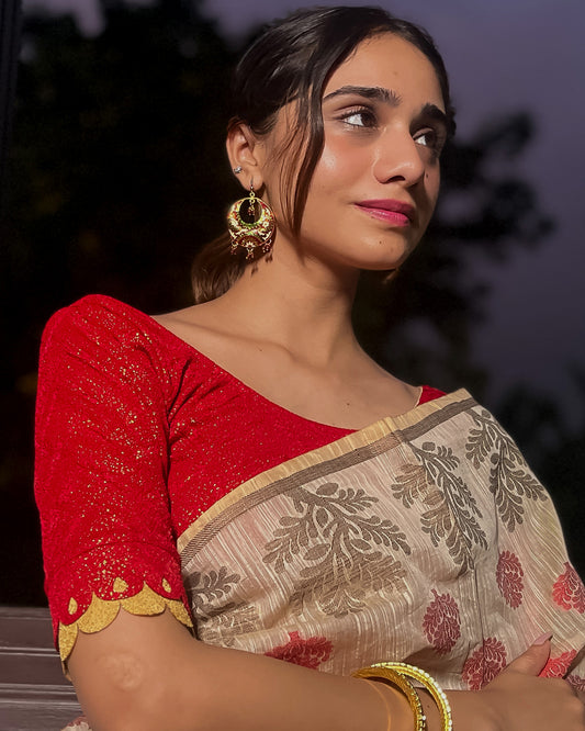 Model pairing the blouse with a saree for a festive look.