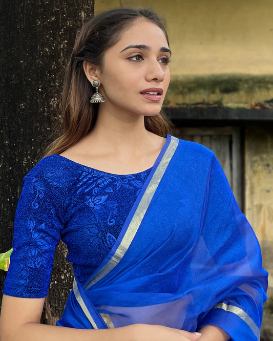 Model pairing the blouse with a saree, demonstrating a festive-ready ensemble.