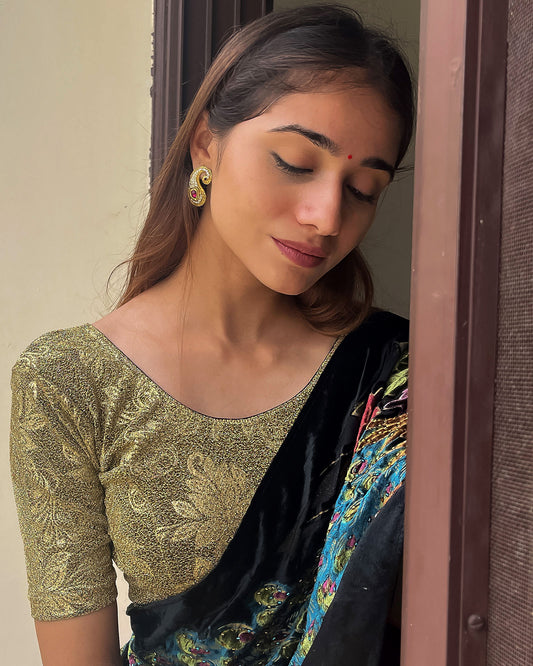 Model pairing the blouse with a saree, demonstrating a festive-ready ensemble.