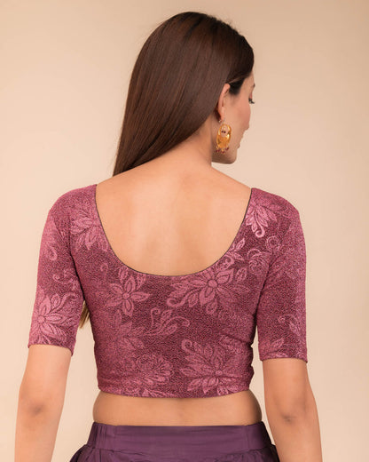 Rear view showcasing the metallic embossed pattern on the fabric.