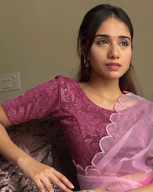 Model pairing the blouse with a saree, demonstrating a festive-ready ensemble.