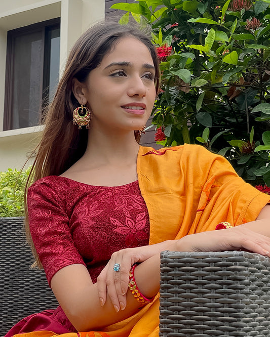 Model pairing the blouse with a saree, demonstrating a festive-ready ensemble.